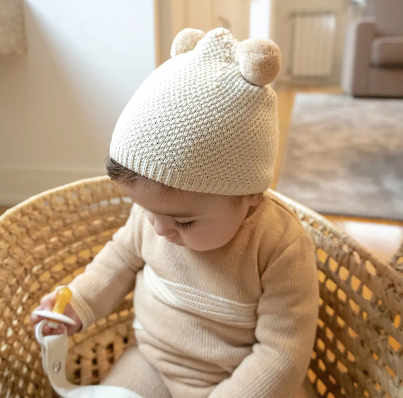 Cappellino in maglia con ponpon
